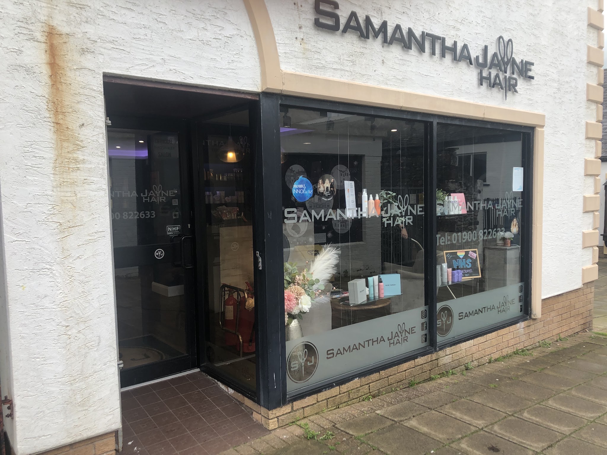 The Samantha Jayne Hair shopfront on Lowther Went, with the sign above the windows