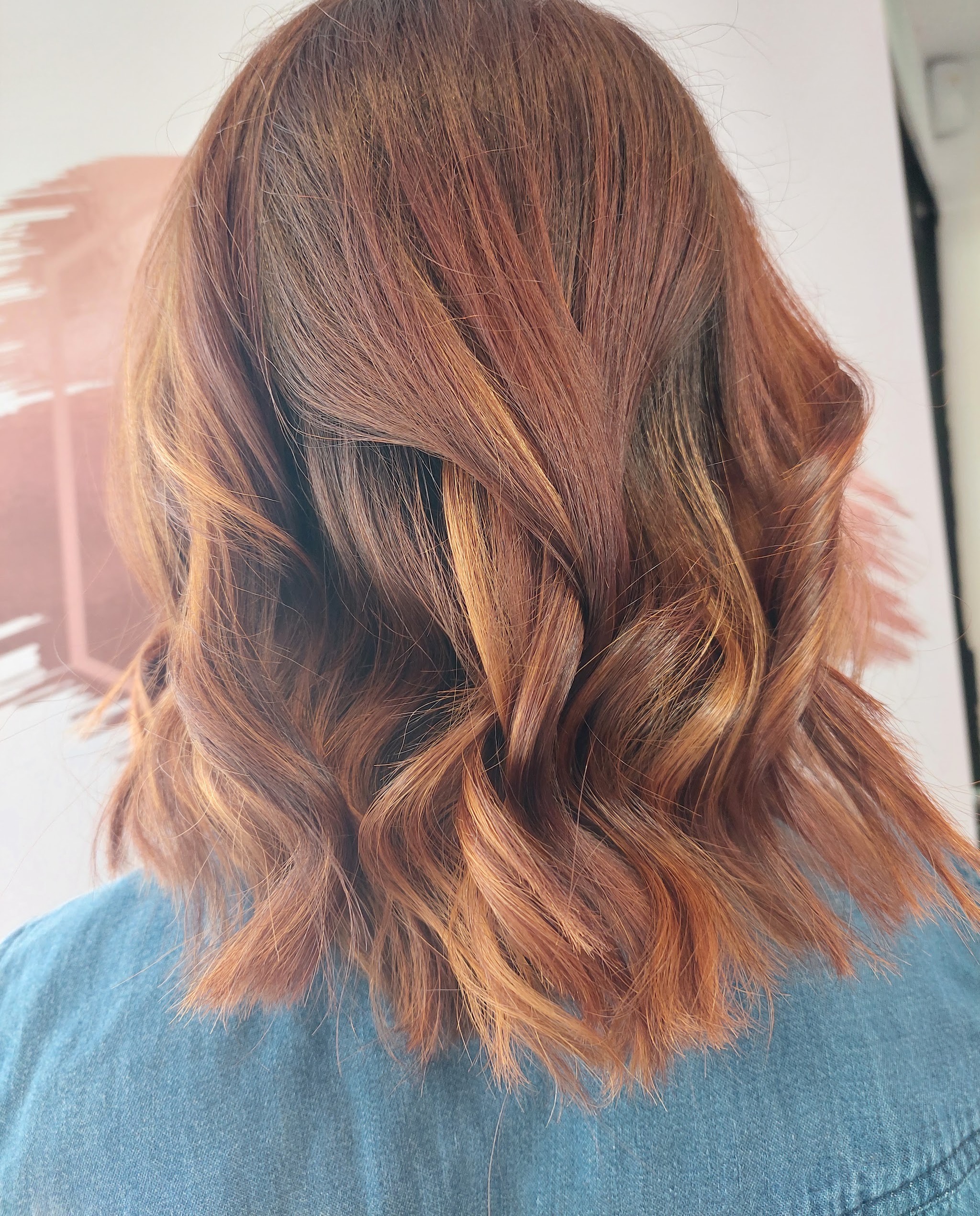 Copper colour with caramel balayage, softly waved