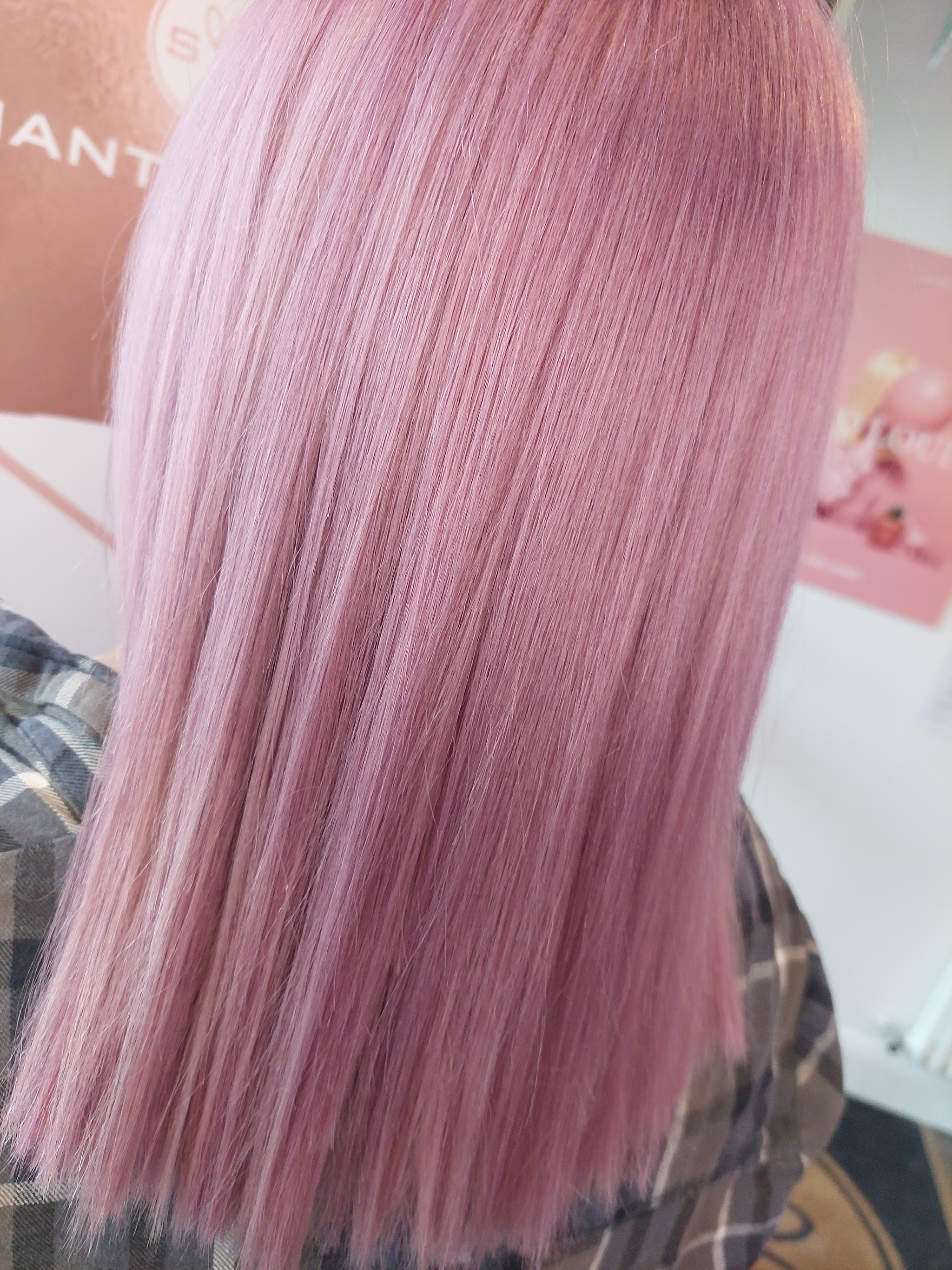 Long straight hair in a pastel pink