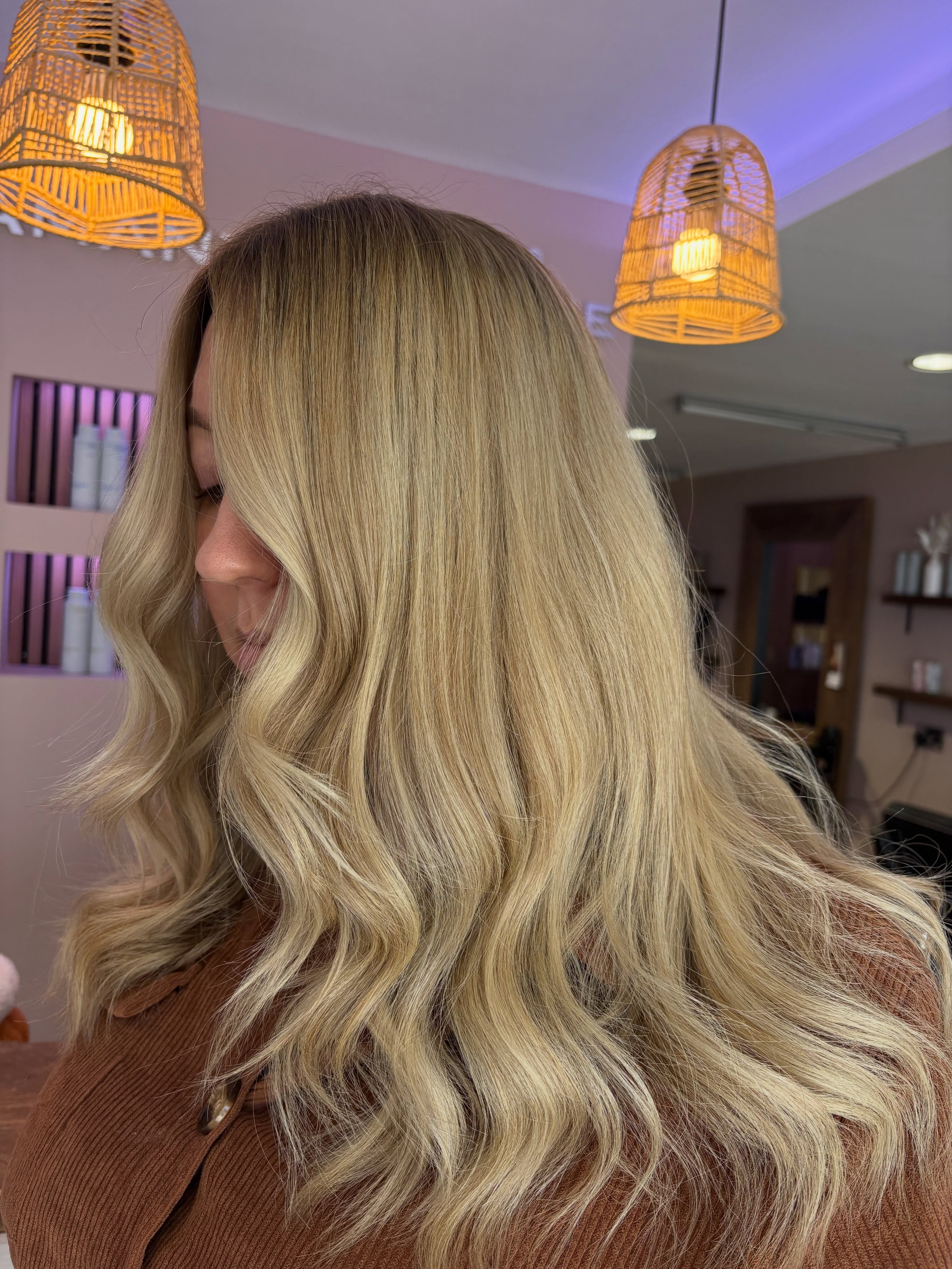 Blended blonde waves, finished in the salon